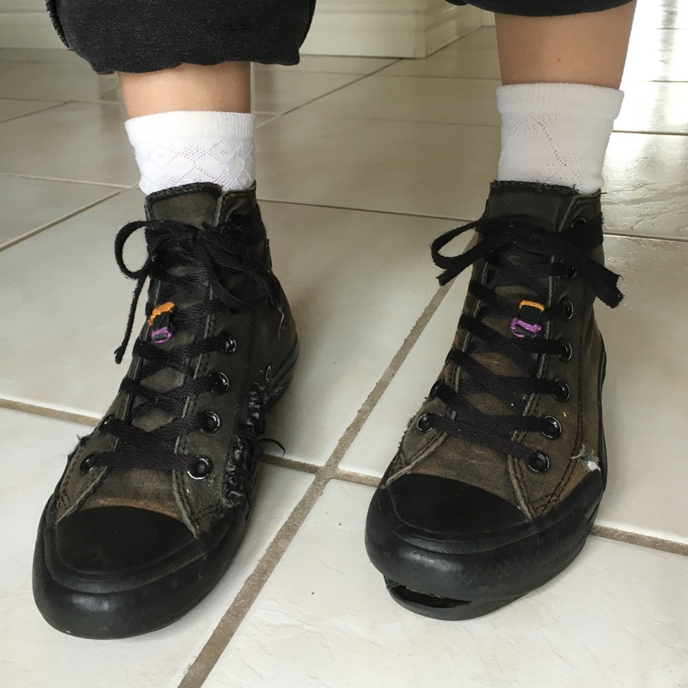 Distressed black converse